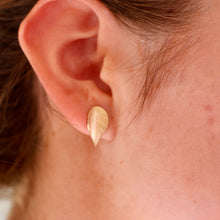 Load image into Gallery viewer, 9ct gold earring on earlobe - matt finish and engraved leaf pattern
